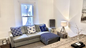 Apartment | Living area - Air Sanitizers and Full Anti-Bacterial Cleaning Between Guests - Nancie's Place (Dartmouth)