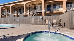 Outdoor pool, open 9:00 AM to 9:00 PM, pool umbrellas