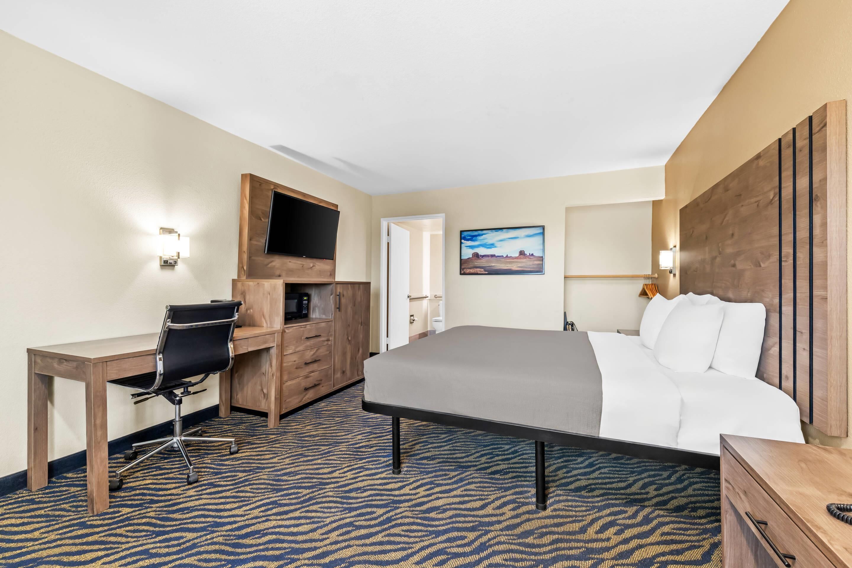 Premium bedding, desk, laptop workspace, soundproofing