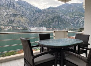 Outdoor dining - Stunning, fully refurbished apartment in small, exclusive complex with pool (Kotor)