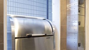 A modern elevator with a metallic finish and a digital display. - B1  Maison Philippe Shitaya 201 (Tokyo)