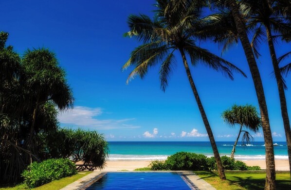 On the beach, sun-loungers, beach towels