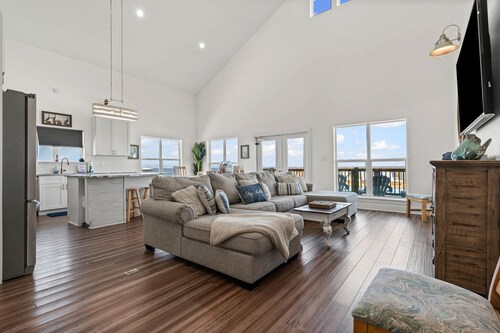 Postcard two-story home on the bay and a short walk to the beach! With Game Room