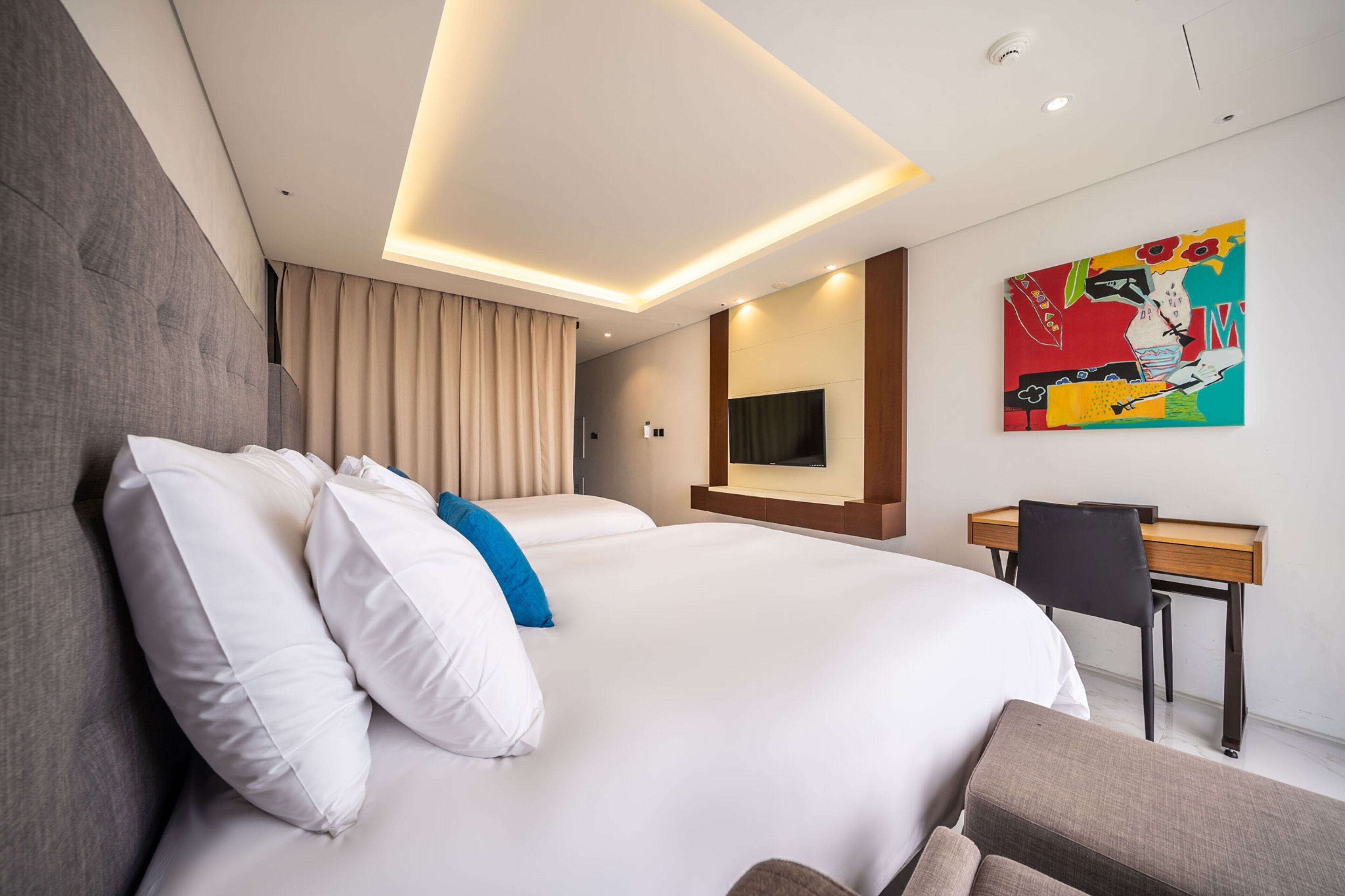 deluxe family room ocean | minibar, in-room safe, blackout curtains, iron/ironing board