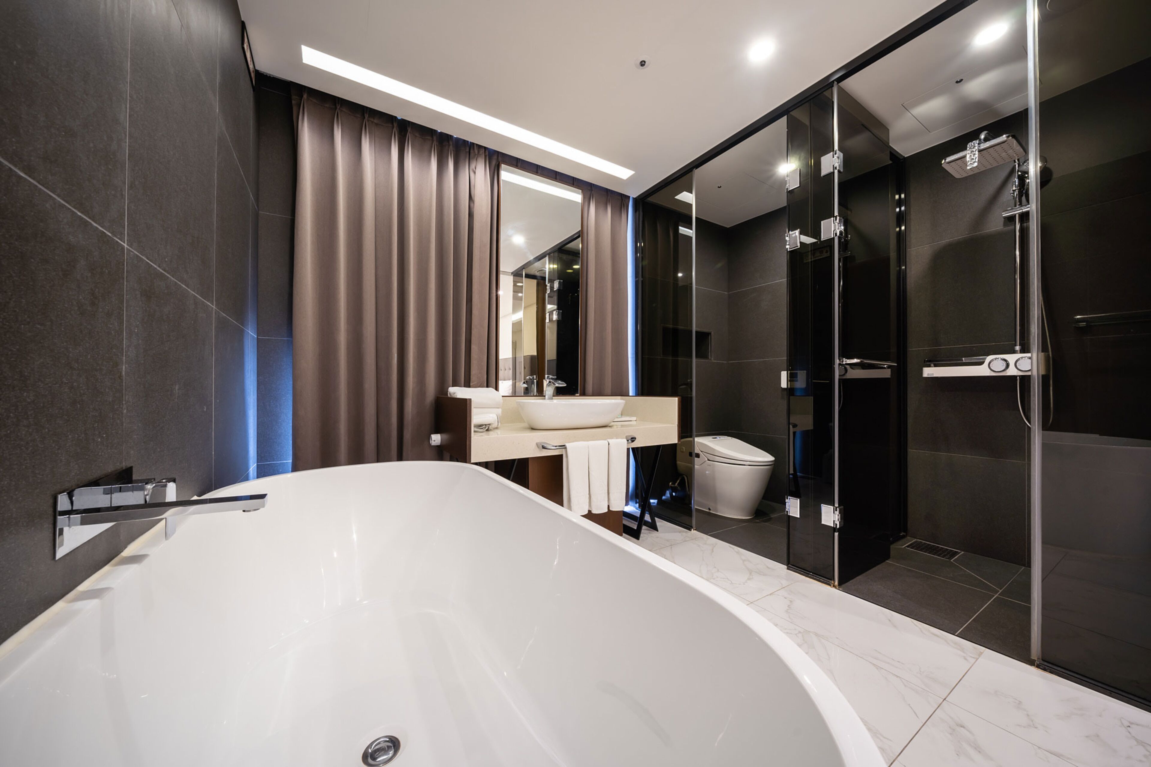 free toiletries, hair dryer, slippers, bidet