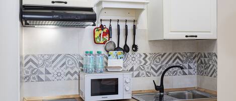 Frigorifero, forno, macchina per tè/caffè, bollitore elettrico