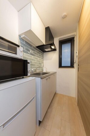 アパートメント 1 ベッドルーム | 専用簡易キッチン | 冷蔵庫、電子レンジ、コンロ、調理器具と食器