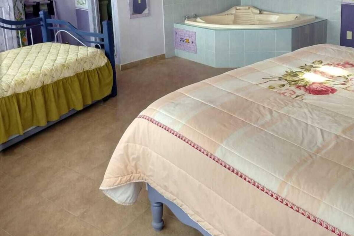 Romantic Suite | Blackout drapes, iron/ironing board, WiFi (free)