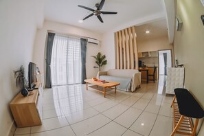 Suite Studio Deluxe, 1 grand lit | Coin séjour