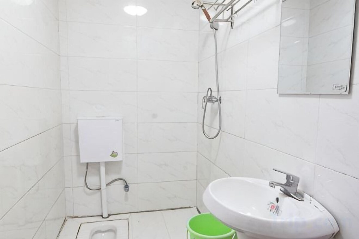 Bathroom | Shower, free toiletries, hair dryer (on request), slippers