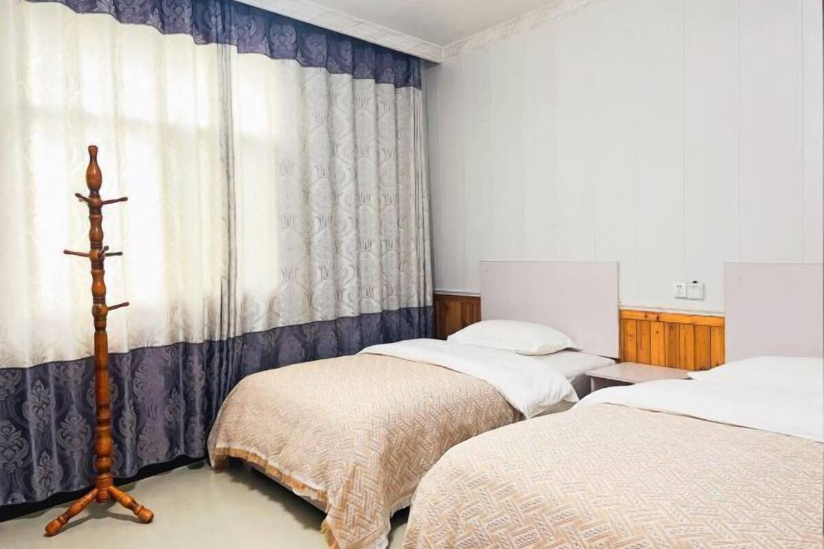 Blackout curtains, free WiFi, bed sheets