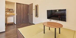 Chambre familiale, non-fumeur | Rideaux d’obscurcissement, accès au Wi-Fi (inclus), literie fournie