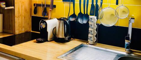 Microwave, coffee/tea maker, cookware/dishes/utensils