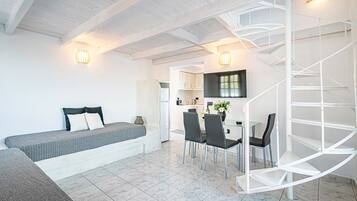 Loft Deluxe | Coin séjour | TV connectée