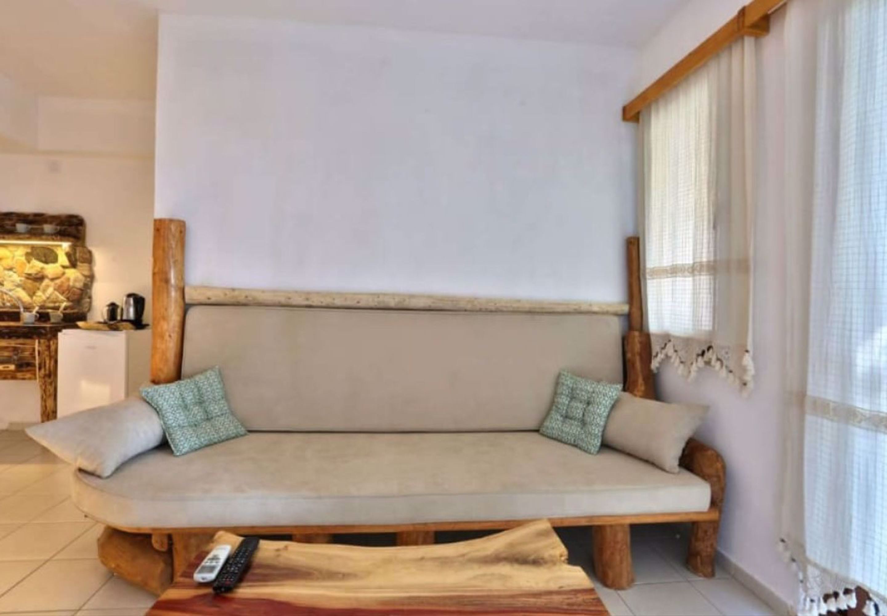 deluxe studio suite, garden floor | living area | 21-inch lcd tv with satellite channels, tv