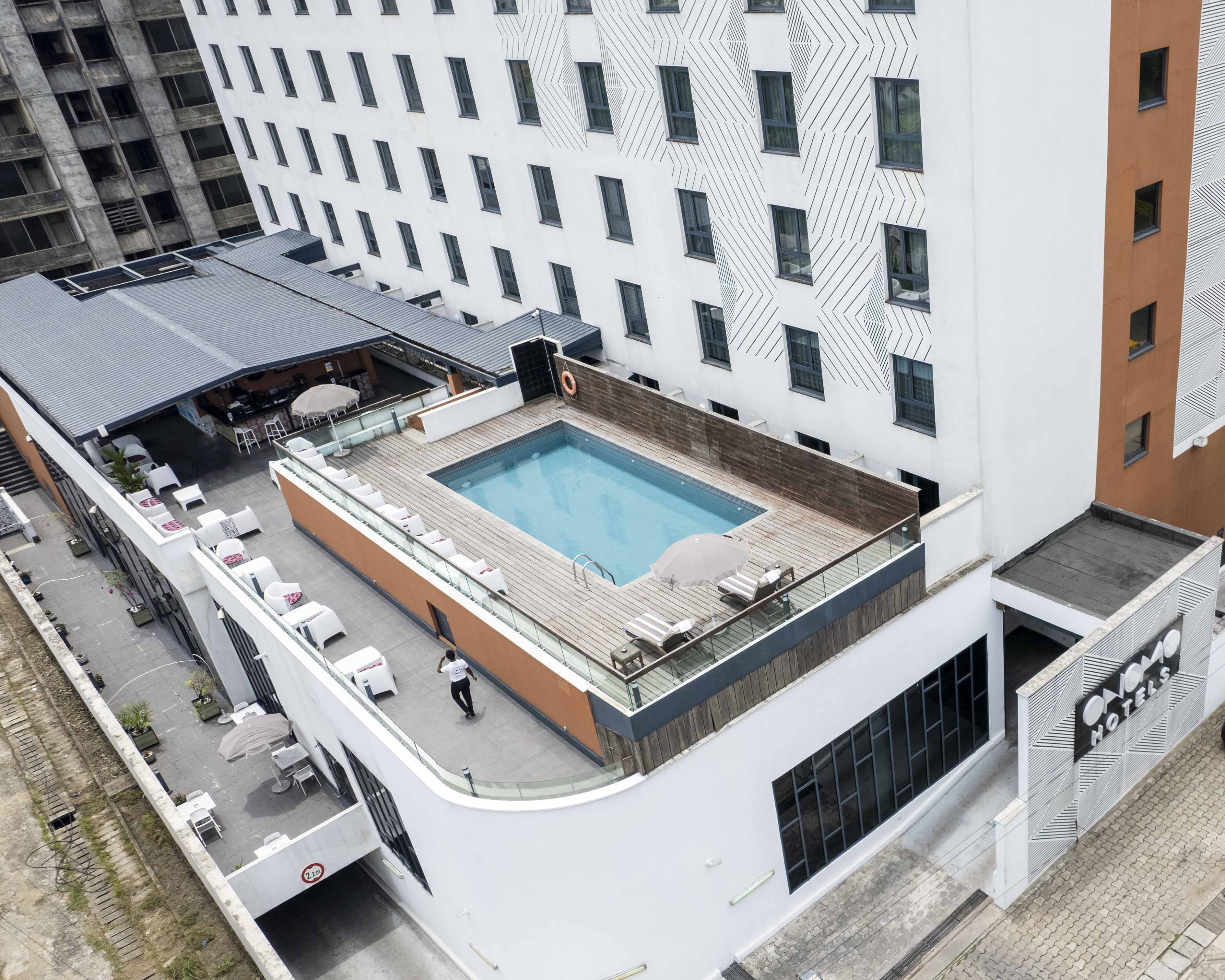 outdoor pool, pool umbrellas, pool loungers