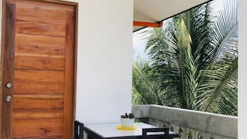 Habitación doble Deluxe, vista al jardín | Terraza o patio