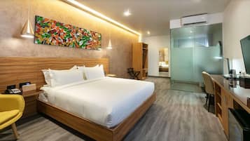 Deluxe Room, 1 King Bed, Non Smoking (Shower Only) | Minibar, in-room safe, desk, laptop workspace