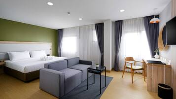 Deluxe Room, 1 King Bed, Garden View | Minibar, in-room safe, individually decorated, individually furnished