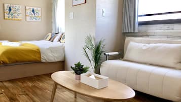 Apartment, 1 Bedroom | Living area | TV