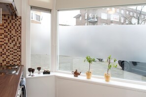 Apartamento urbano | Cozinha privada | Geladeira, fogão, cooktop, cafeteira/chaleira