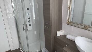 Departamento, baño en la habitación | Baño