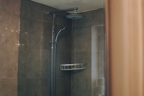 Studio | Bathroom | Shower, rainfall showerhead, hair dryer, towels
