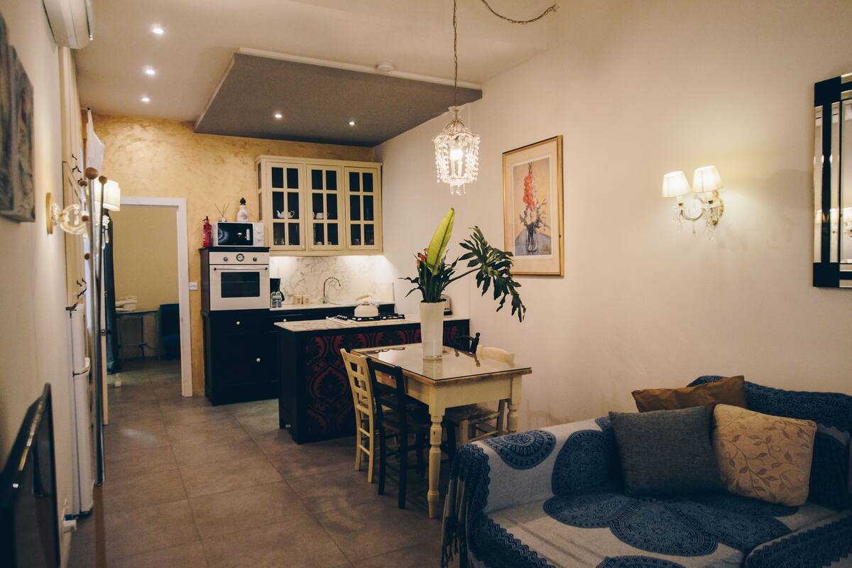 Superior Apartment | Living area | Flat-screen TV