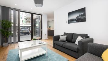 Chambre Luxe | Coin séjour