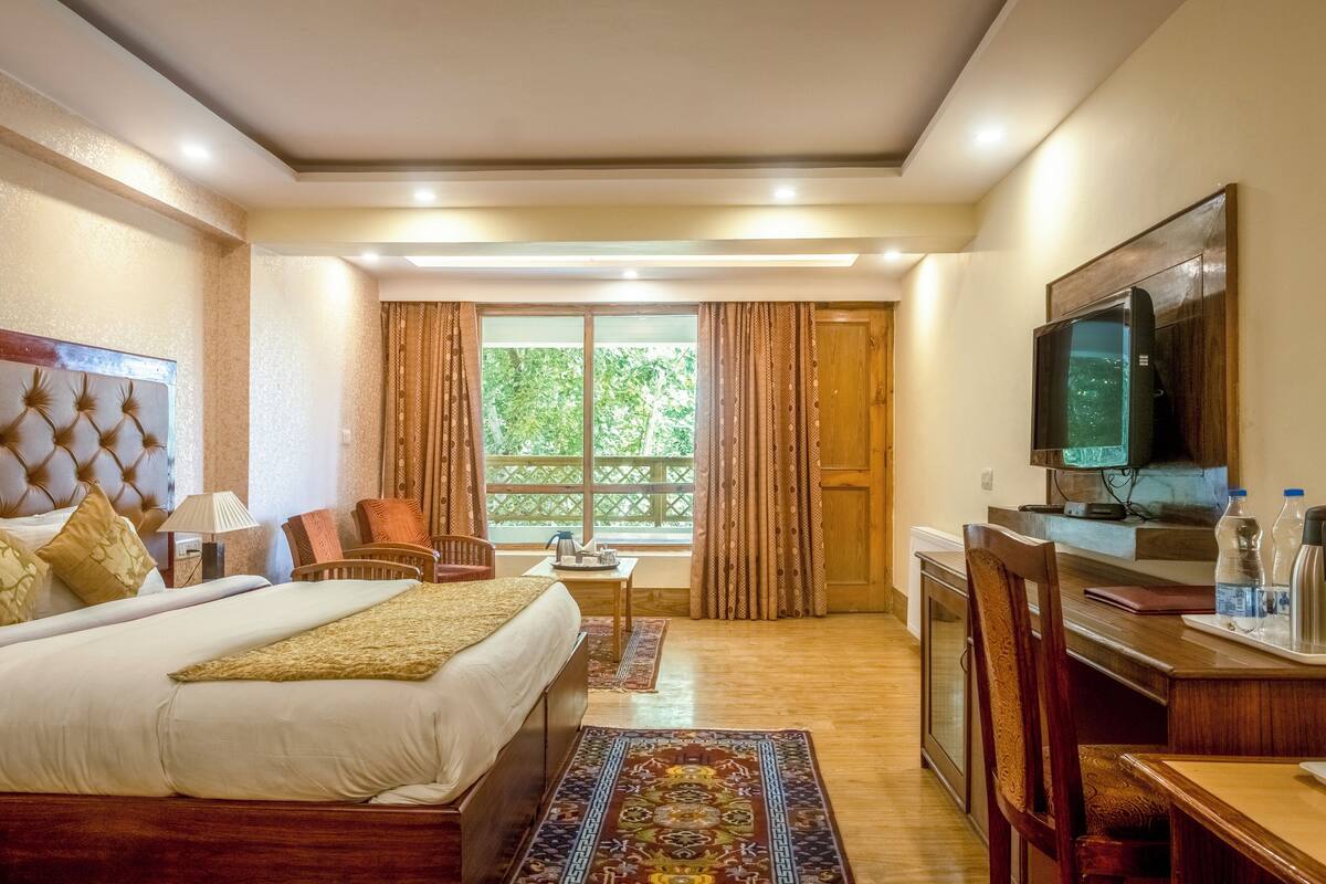 Suite Deluxe | Copriletto in piuma, materassi a doppio strato, una scrivania