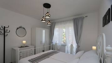 2 dormitorios, tabla de planchar con plancha, Internet y ropa de cama