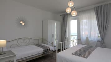 2 dormitorios, tabla de planchar con plancha, Internet y ropa de cama