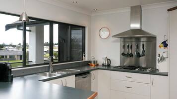 Coffee/tea maker, fridge, microwave, oven