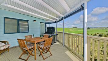 Enjoy al fresco dining on the deck with a grill at your fingertips.