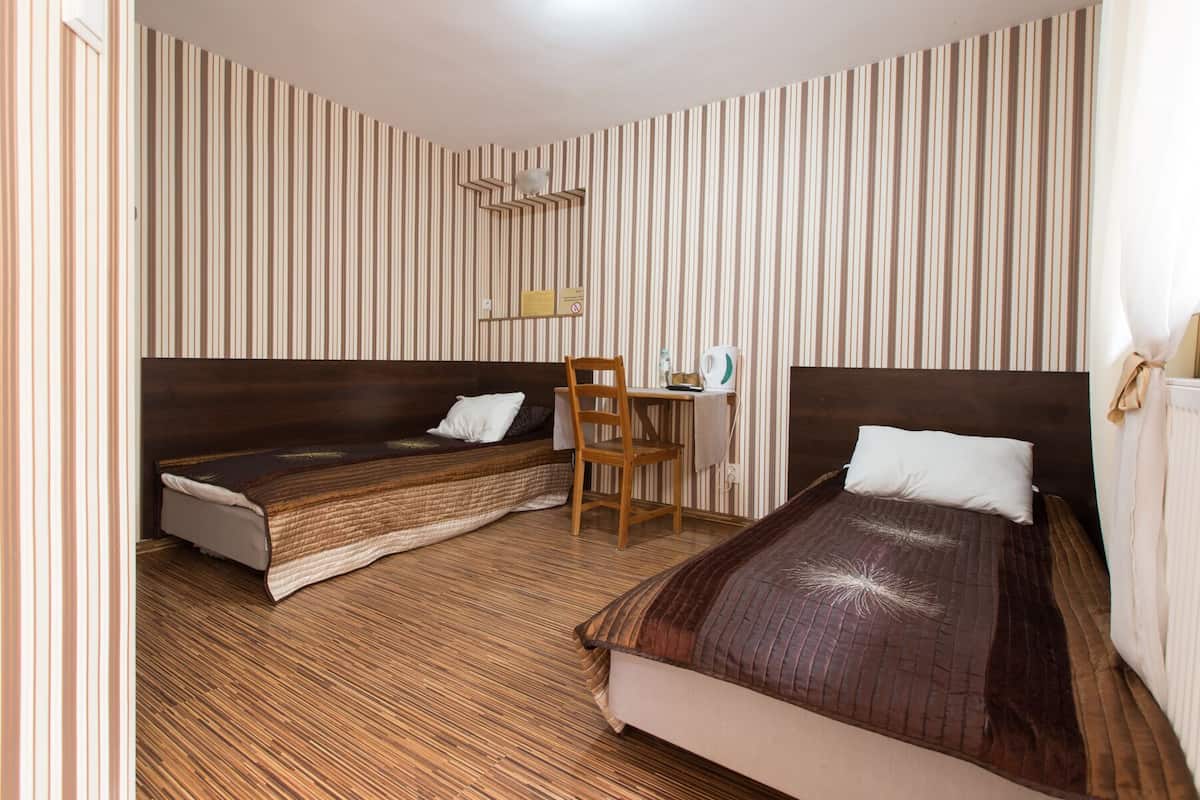 Twin Room, Bathtub | Laptop workspace, iron/ironing board (on request), free WiFi, bed sheets