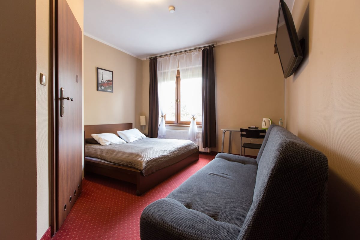 Quadruple Room | Laptop workspace, iron/ironing board (on request), free WiFi, bed sheets