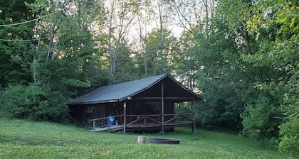 Exclusive Single Log Cabin By a fully stocked Lake