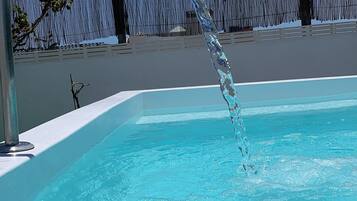 Outdoor pool, pool umbrellas, pool loungers