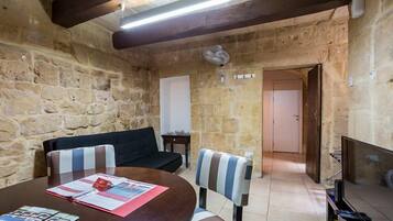 Apartment, 2 Bedrooms | Living area | Flat-screen TV