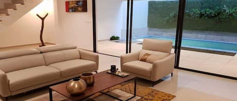 Luxury Villa | Living area | 40-inch flat-screen TV with satellite channels, TV