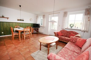 Apartamento | Área de estar | TV