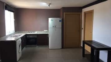 Apartment, 2 Bedrooms | Private kitchen | Full-size fridge, microwave, stovetop, cookware/dishes/utensils