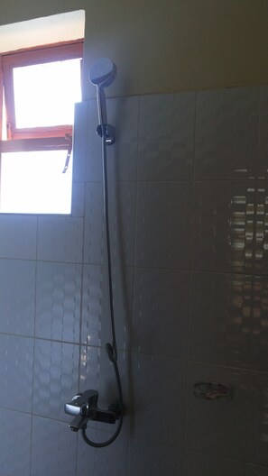 Regadera en el baño