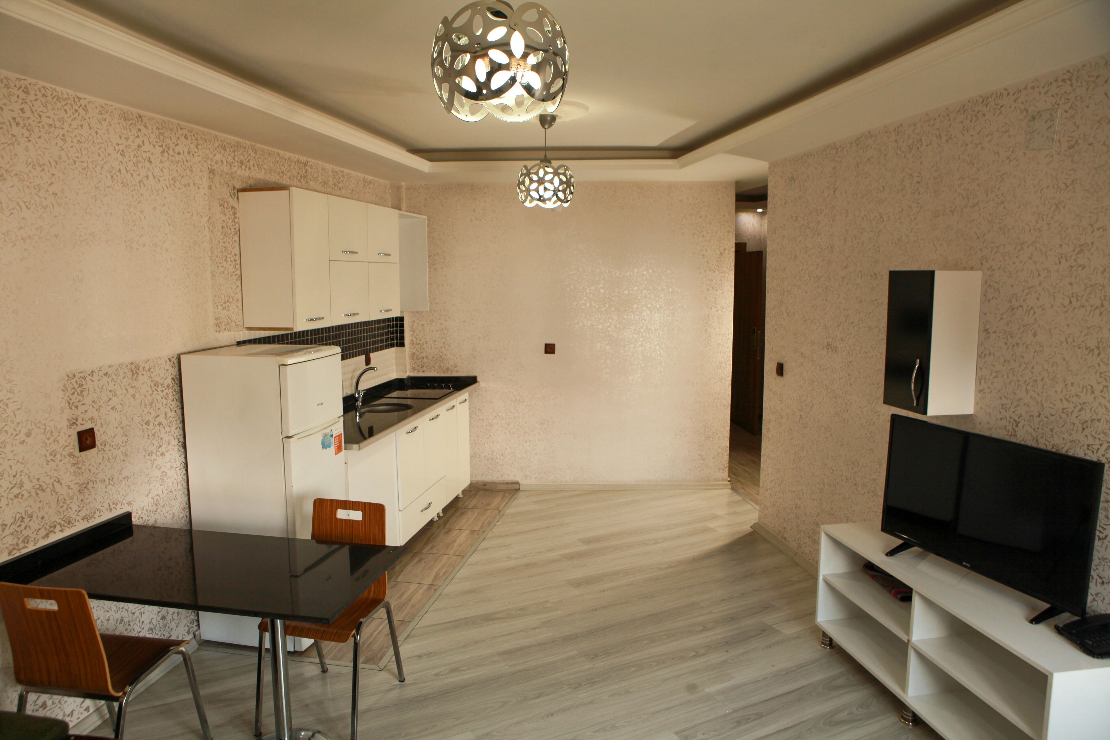 suite, city view | living area | lcd tv