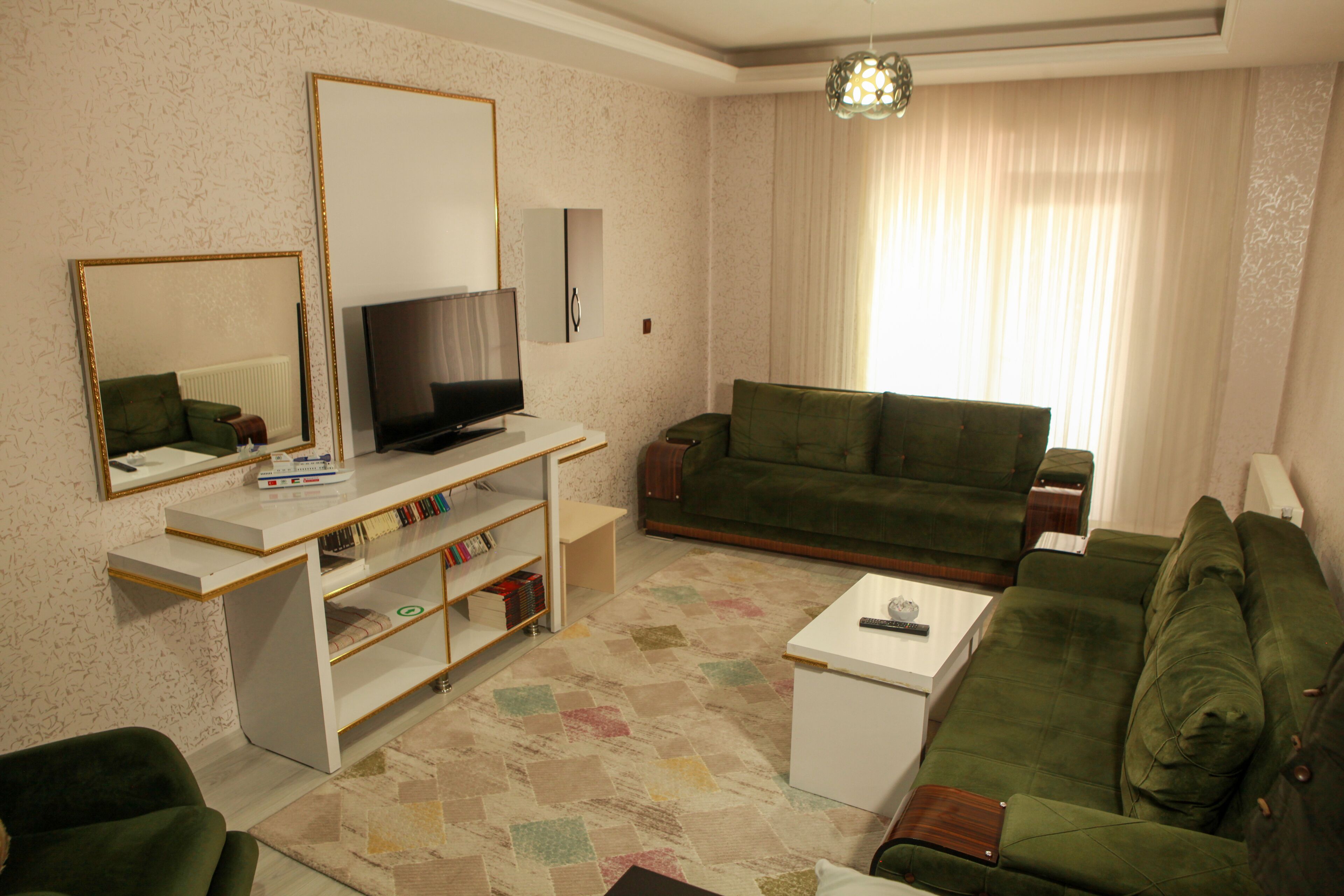 suite, city view | living area | lcd tv