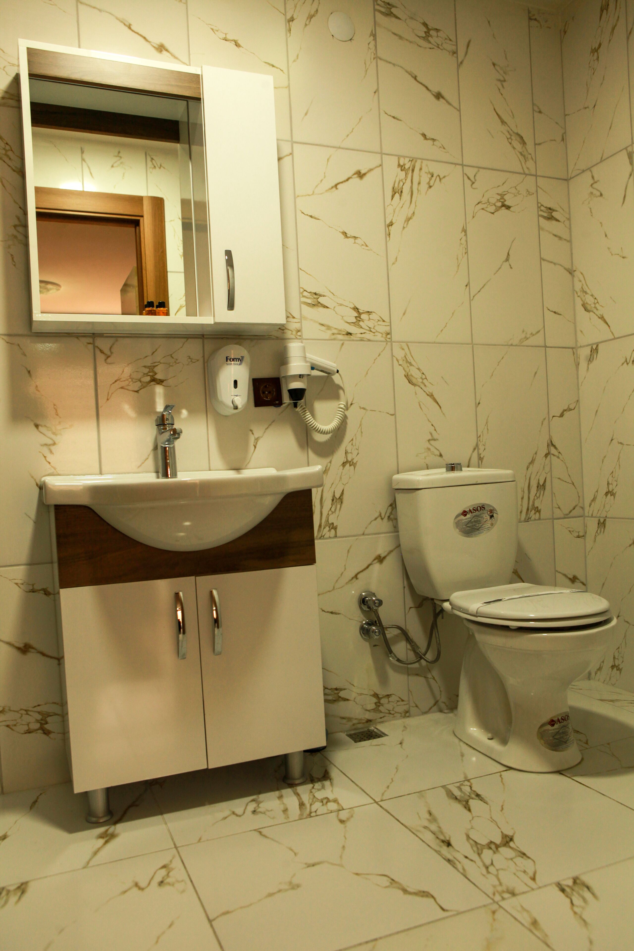suite, city view | bathroom | shower, hydromassage showerhead, free toiletries, hair dryer