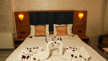 Suite, City View | 1 bedroom, in-room safe, desk, free WiFi