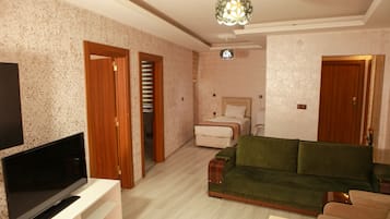 Suite, City View | Living area | LCD TV