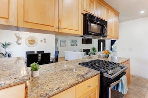 Enjoy cooking in this well-equipped kitchen with a dining area.
