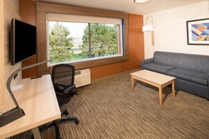 Deluxe Room, Multiple Beds | In-room safe, desk, laptop workspace, blackout drapes